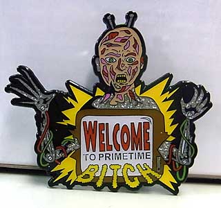 VILE CONSUMPTION ENAMEL PIN WELCOME TO PRIMETIME BITCH